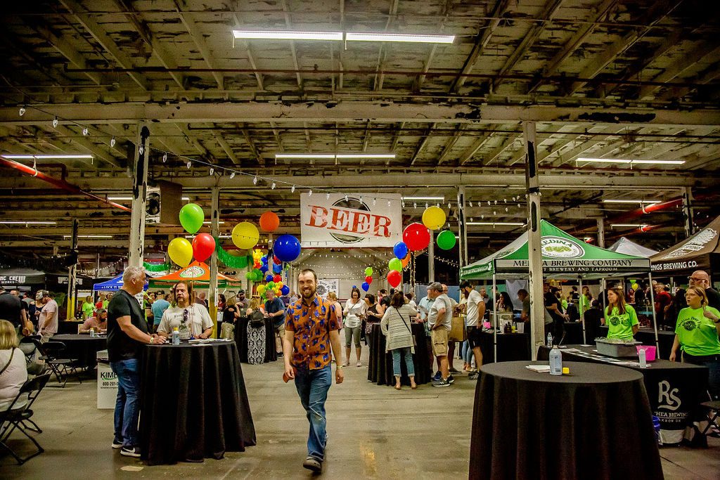 People enjoying Medina Beer Fest indoors